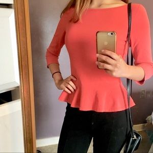 ALAÏA Paris Coral Peplum Top